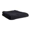 Black merino fleece and tencel blanket on a white background