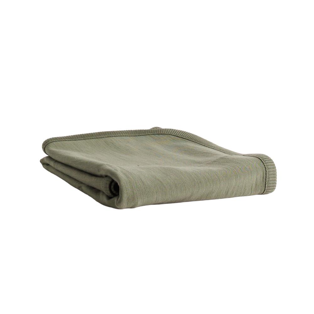 Olive green merino/tencel fleece blanket against a white background