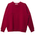 A deep red merino fleece and tencel crewneck nursing sweatshirt with an invisible zipper seam across the front shown flat on a white background.