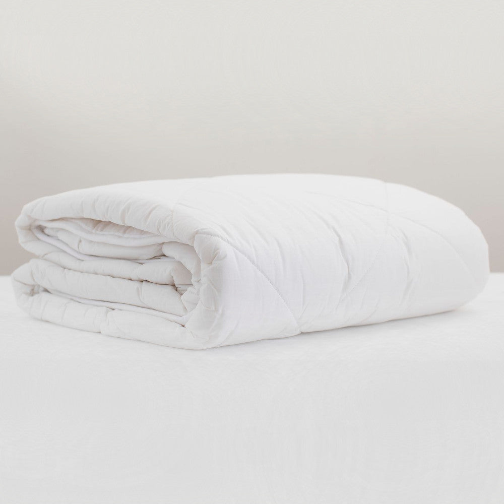 Wool duvet inner folded on a white background