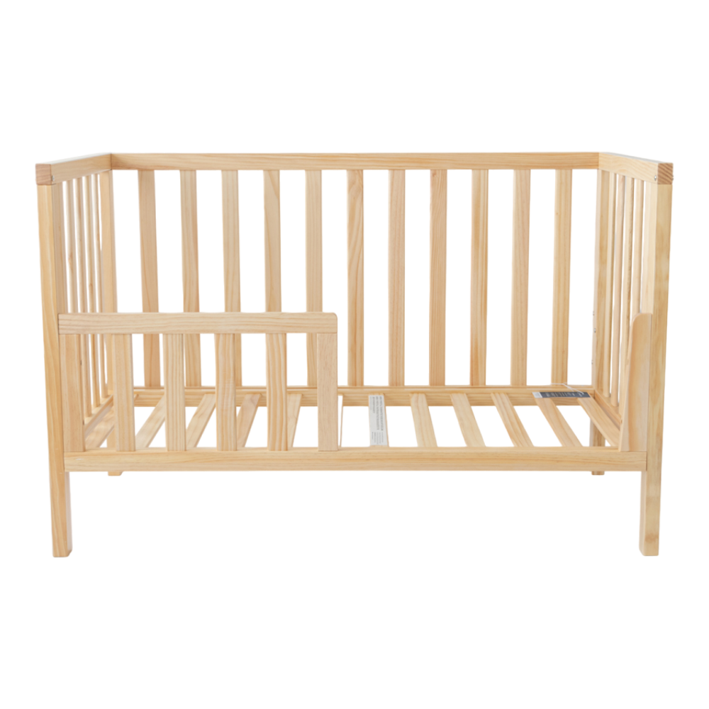 Wooden crib on a white background