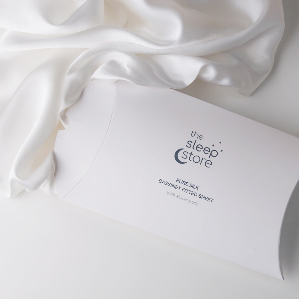 Silk Fitted Sheet out of packaging on a white background