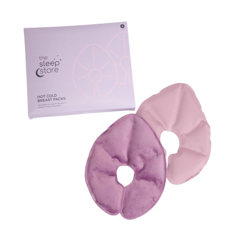 Pink hot and cold therapy breast pack with packaging labeled 'The Sleep Store' on a white background