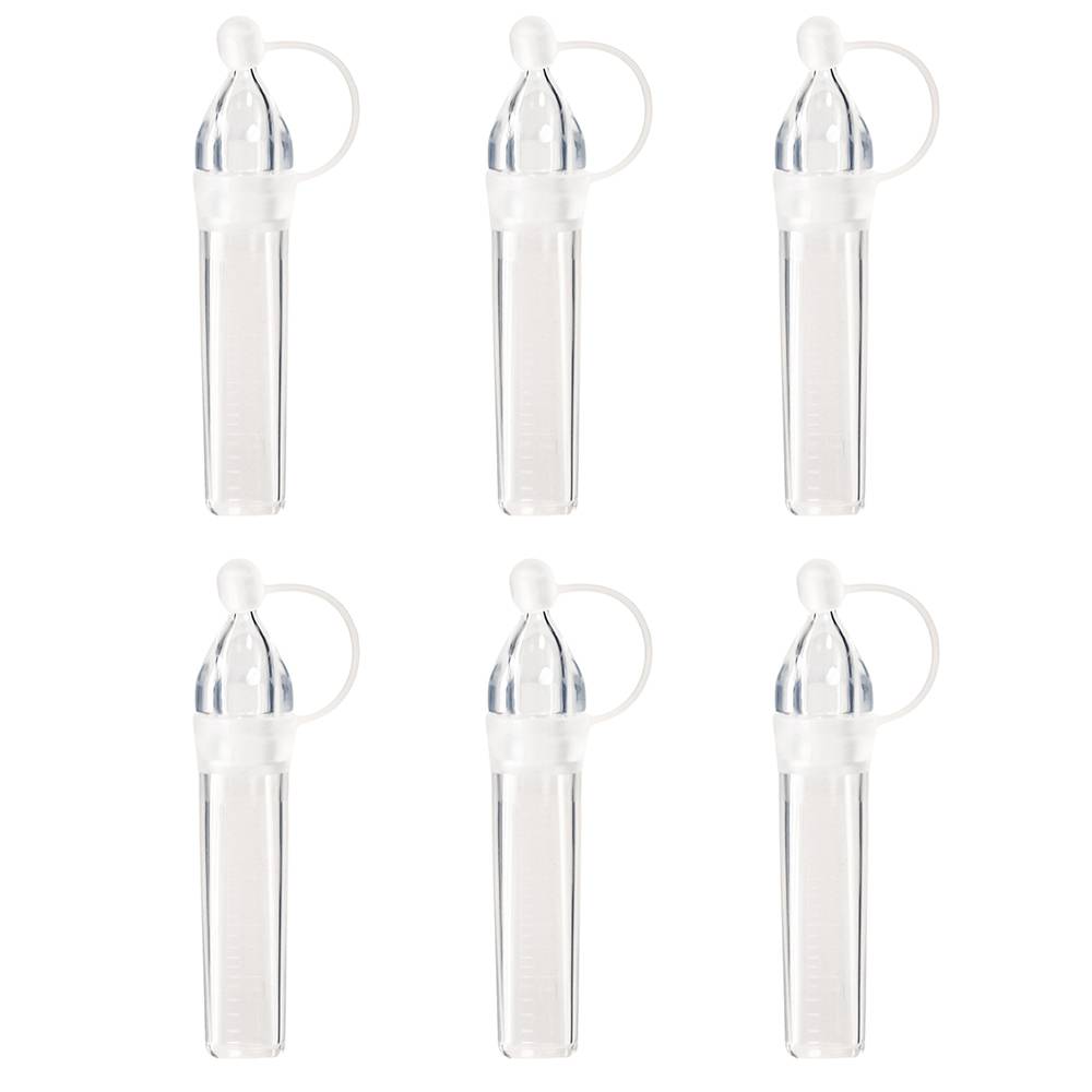 Set of six clear plastic colostrum collectors with caps on a white background
