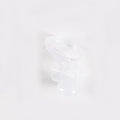 Clear plastic pump part on a white background
