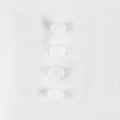 Clear silicone pump parts on a white background