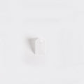 Clear silicone duck bill valve for wearable breast pump on a white back ground