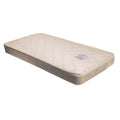 Beige coloured quilt patterned cot mattress with shiny label on a white background