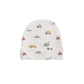 White cotton baby beanie with toy vehicle patterns on a white background