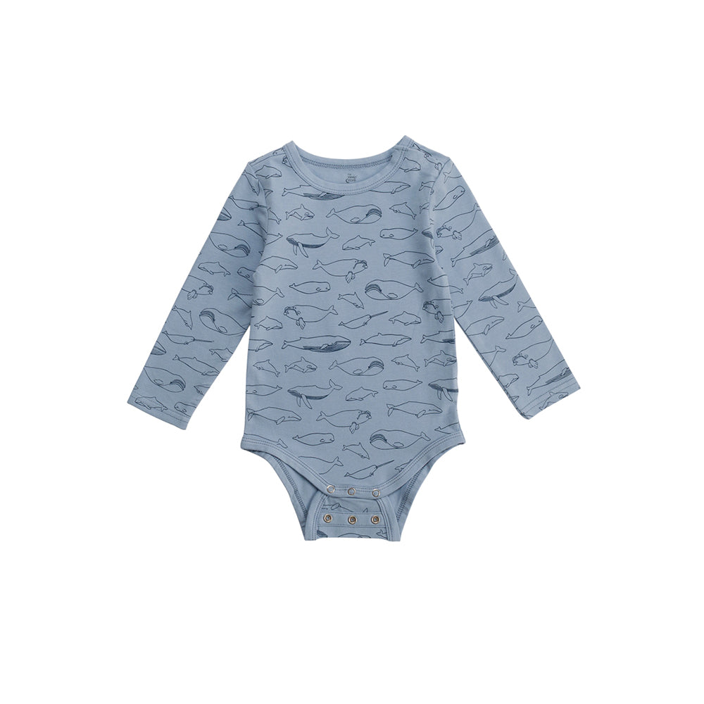 Blue cotton baby bodysuit with whale line patterns on a white background