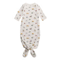 Baby organic cotton knotted gown with vehicle pattern on a white background