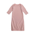 Pink organic cotton baby gown with long sleeves a white background