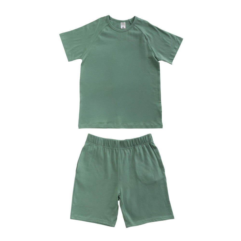Fern green short sleeve PJs on a white background. 