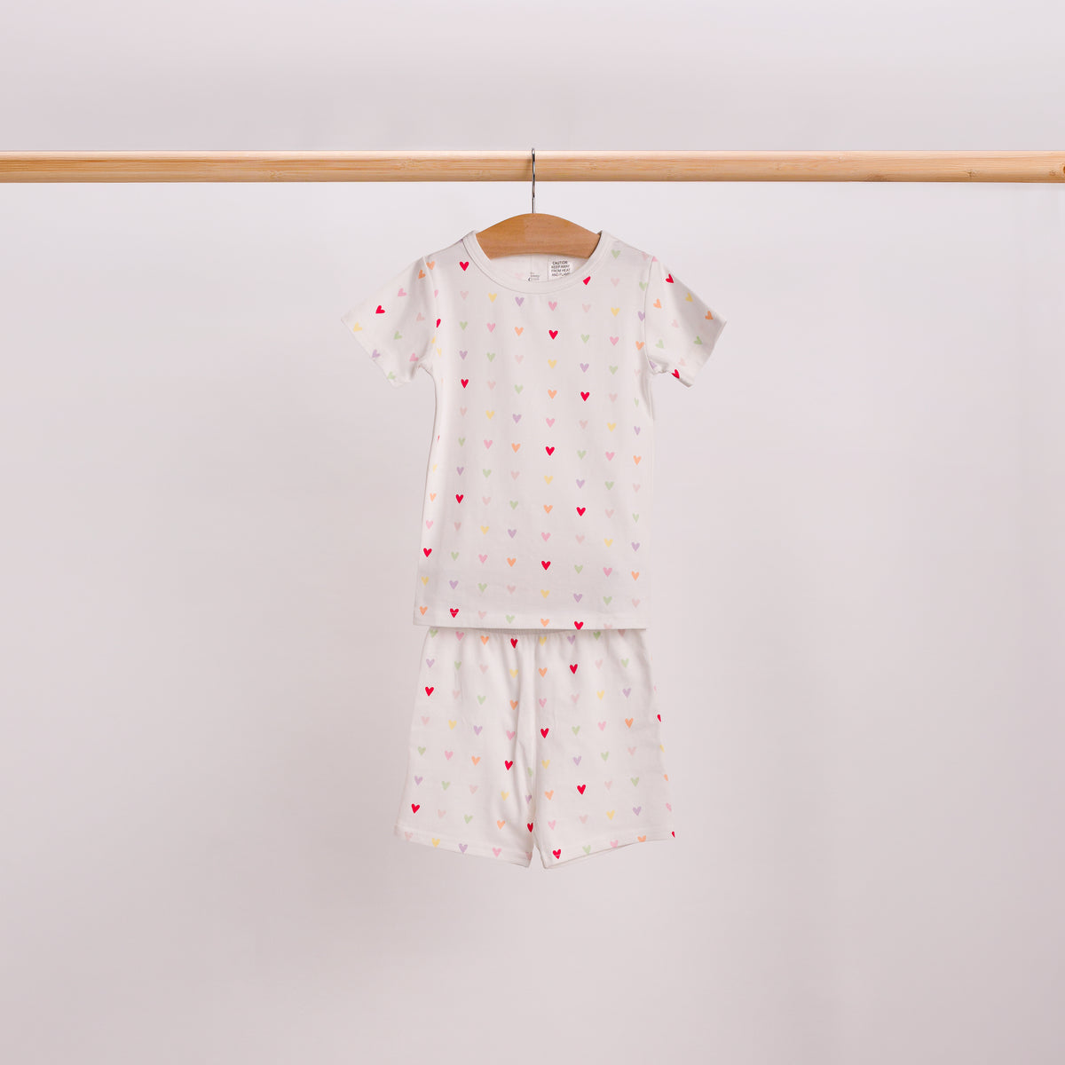 Hanging shot of Summer PJs in Mini Hearts print. 