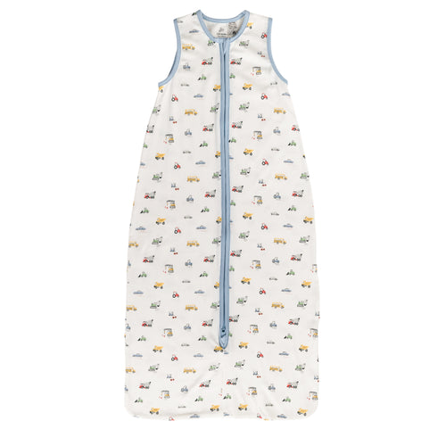 A sleeveless cotton baby sleep sack with cars and trucks on a white background, shown flat against a white background.
