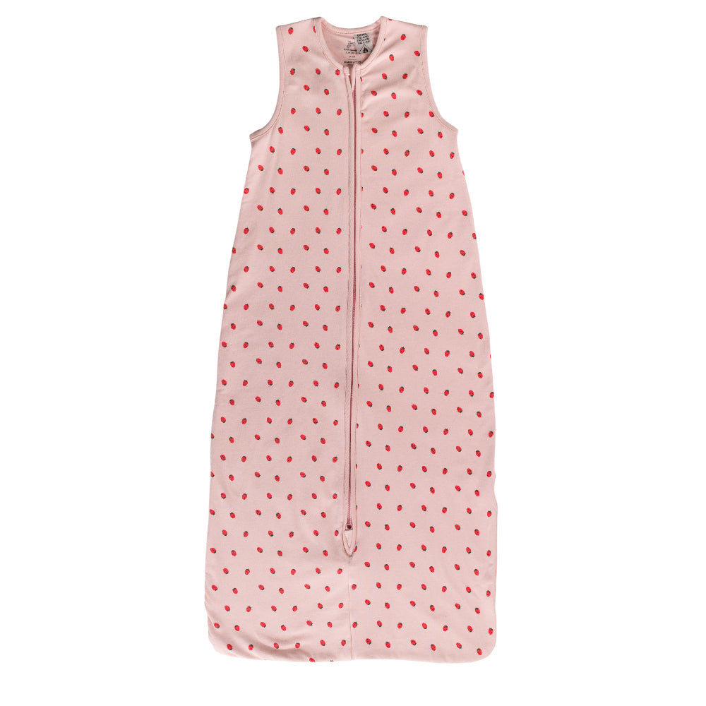 A sleeveless cotton baby sleep sack with Strawberries on a pink background, shown flat against a white background.