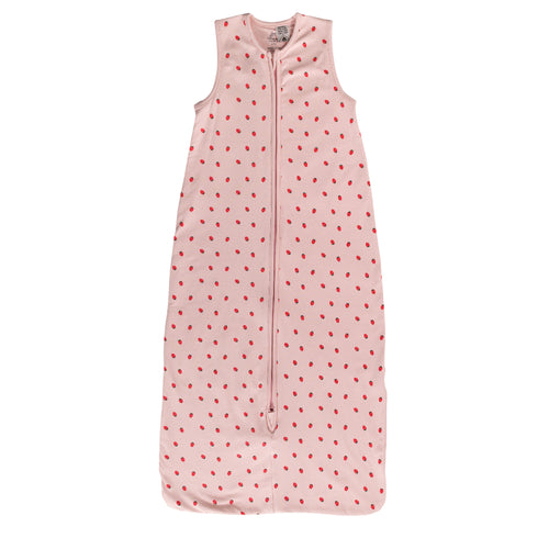 A pink sleeveless cotton baby sleep sack with a strawberries shown flat against a white background.