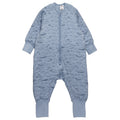 A blue with whales print cotton baby sleep suit with sleeves shown flat against a white background.