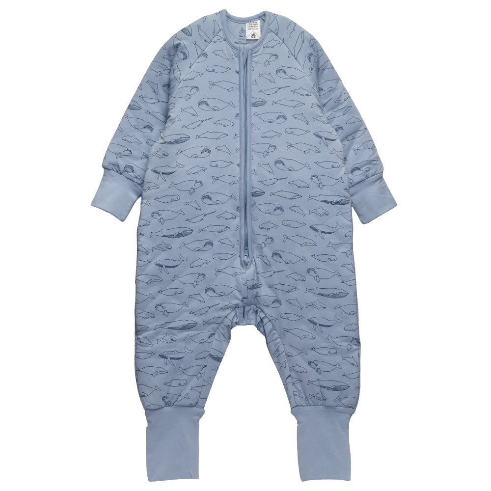 A blue with whales print cotton baby sleep suit with sleeves shown flat against a white background.