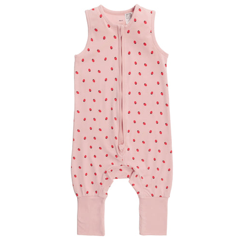 Pink baby sleepsuit with red strawberries on a white background