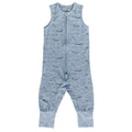 Light blue baby sleepsuit with whale pattern on a white background