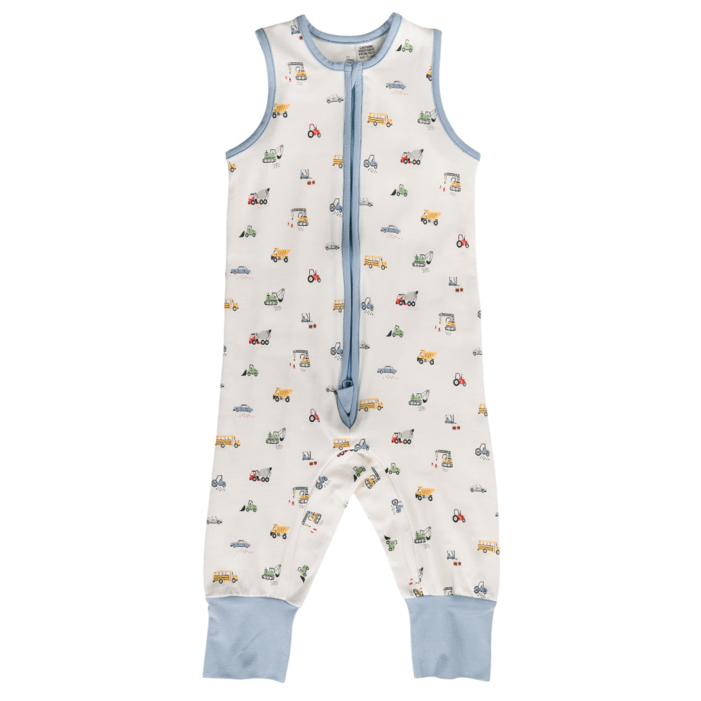 Organic cotton baby sleepsuit with vehicle pattern and blue accents on a white background