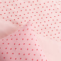 Pink jersey cotton with small strawberry pattern in a duvet and pillow