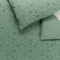 Green cotton jersey fabric duvet with animal pattern and matching pillowcases