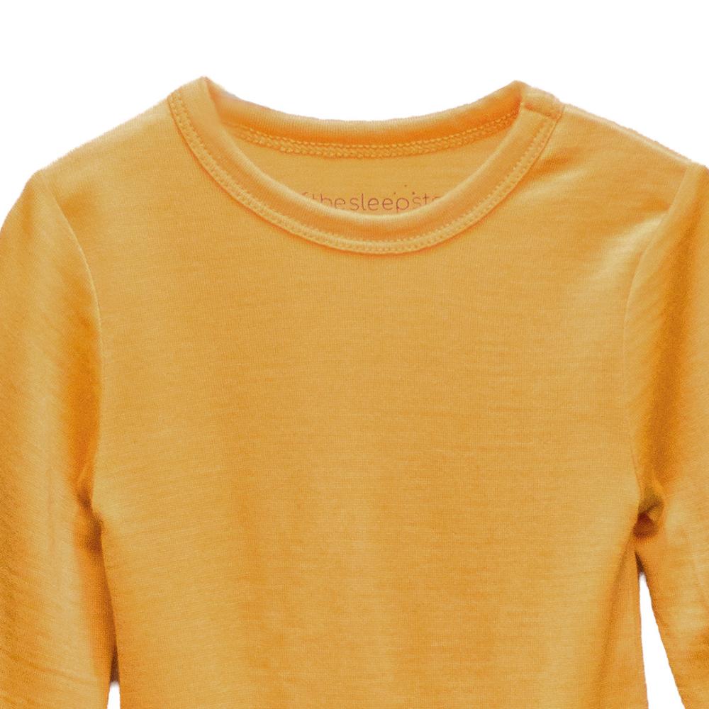 Close up of merino bodysuit neckline