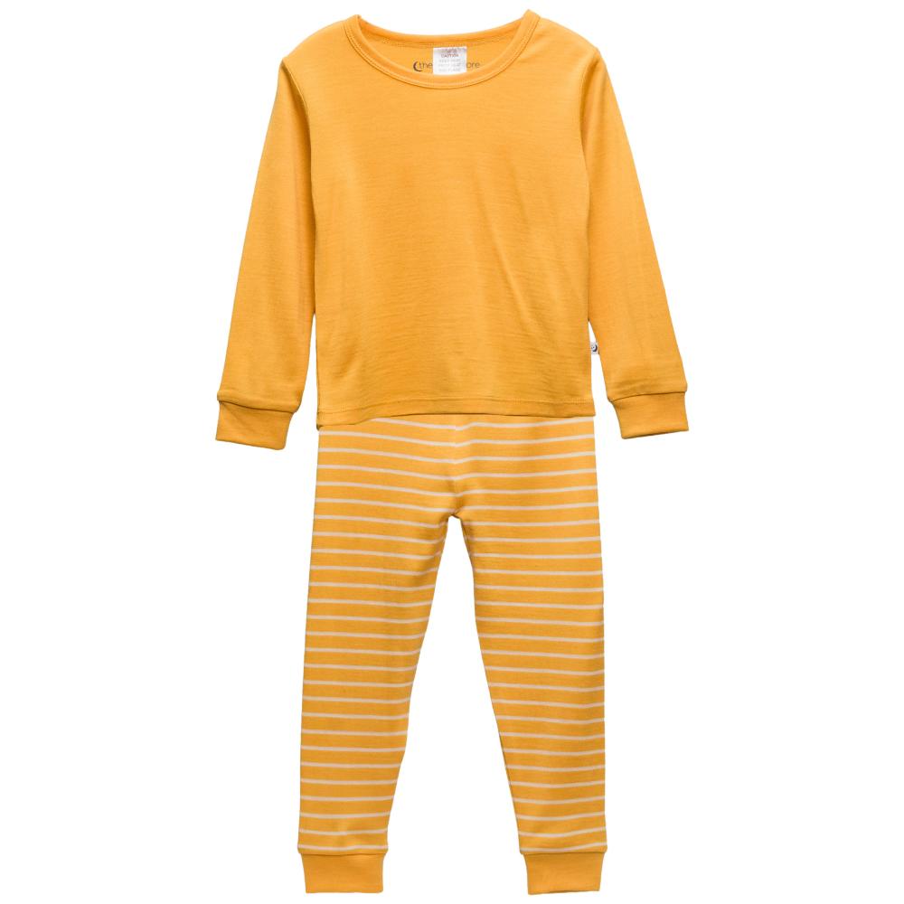 A two-piece children's jersey merino pajama set featuring a solid mustard yellow long-sleeve top and matching striped pants with thin white horizontal stripes.
