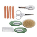 The Sleep Store baby grooming tool set with comb, brush, nail clipper, and scissors on a white background