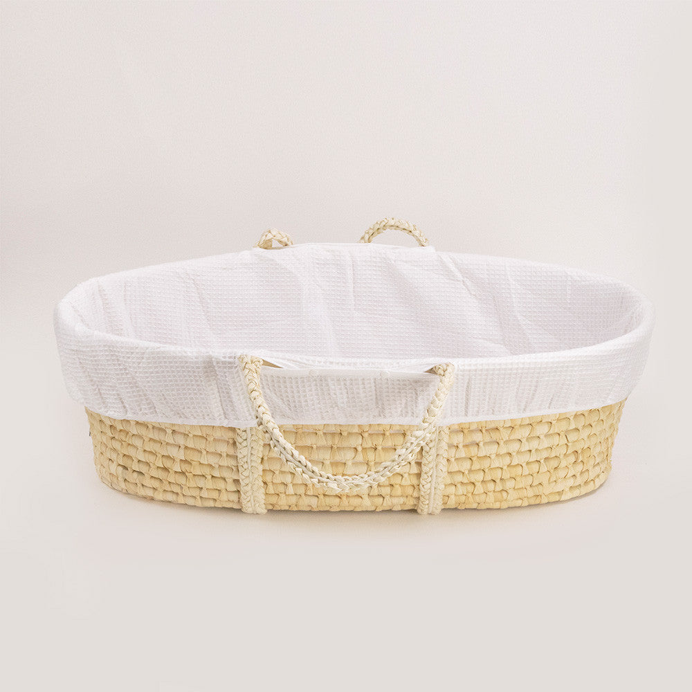 Moses Basket with White Liner on a white background