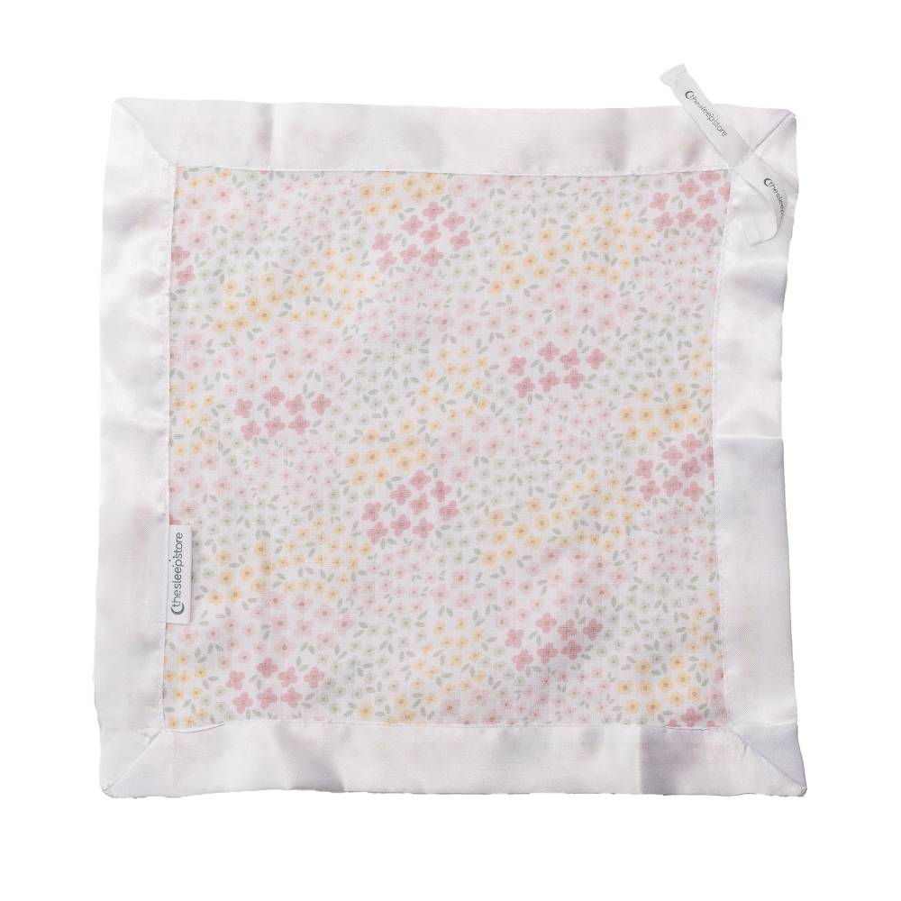The Sleep Store cotton muslin comforter with satin edge in a pink floral