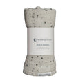 Soft grey Muslin swaddle with star pattern and 'thesleepstore' branding on a white background