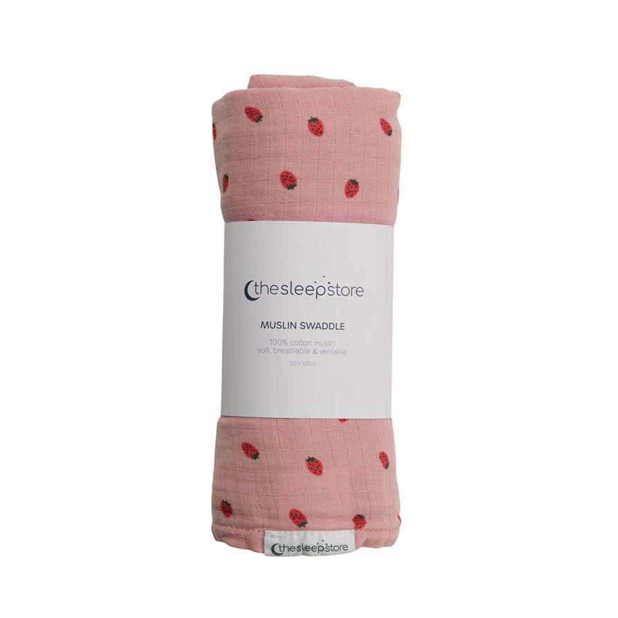 Pink muslin swaddle with berry pattern on a white background