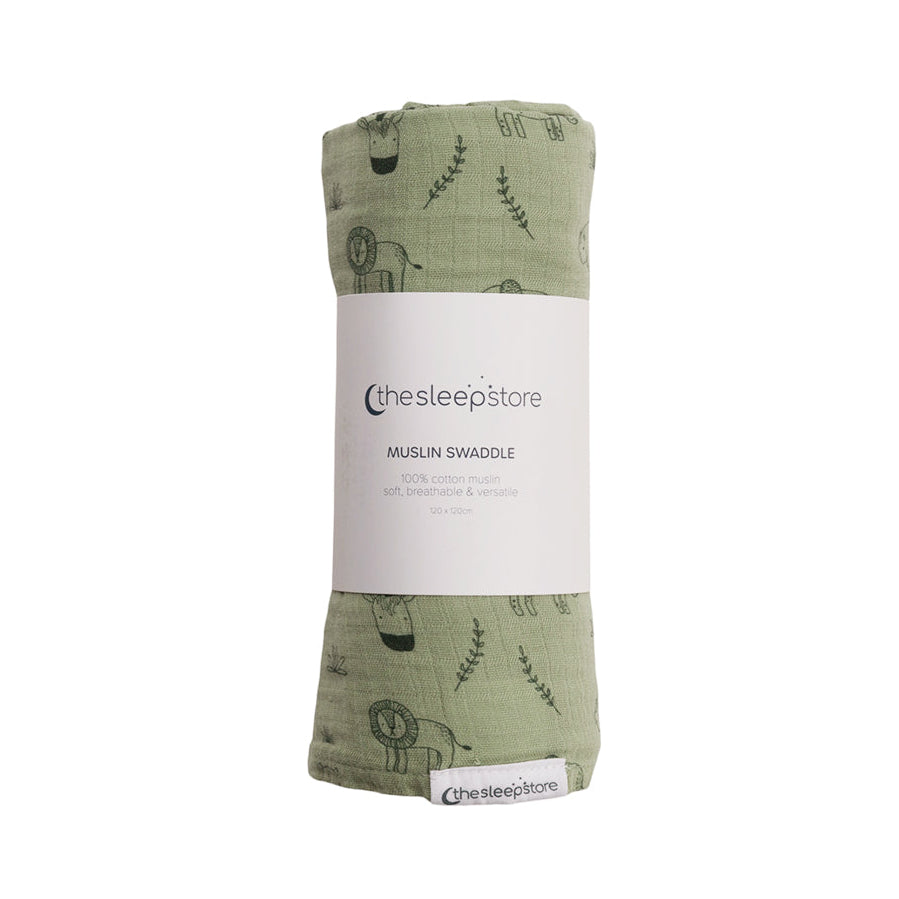 Green swaddle blanket with animal prints and 'The Sleep Store' label on a white background