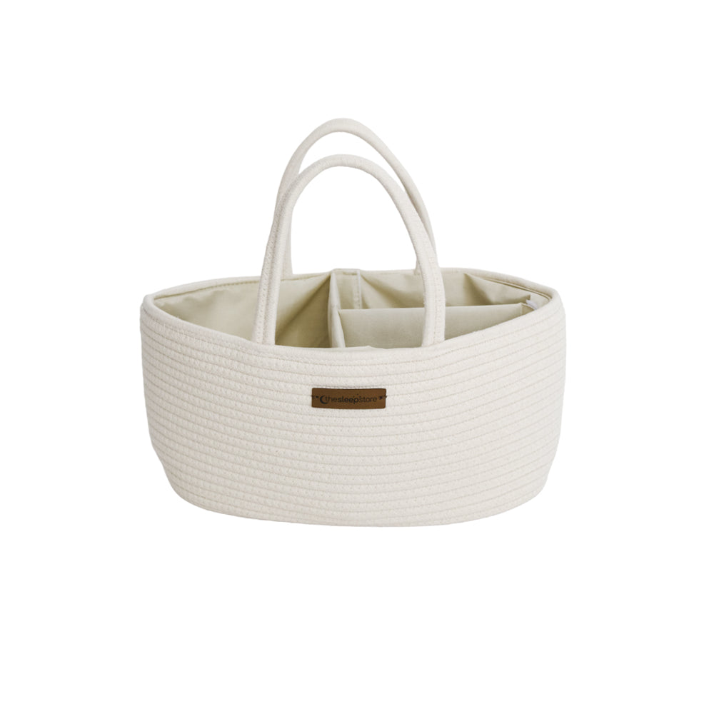 Cream Cotton Nappy Caddy with a brown label on a white background