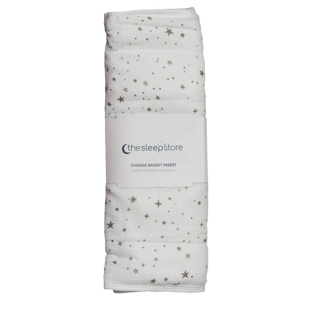 Folded baby change basket pad  with star pattern on a white background, branded 'thesleepistore'.