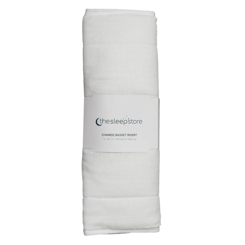 Folded white change pad with 'thesleepstore' branding on a white background