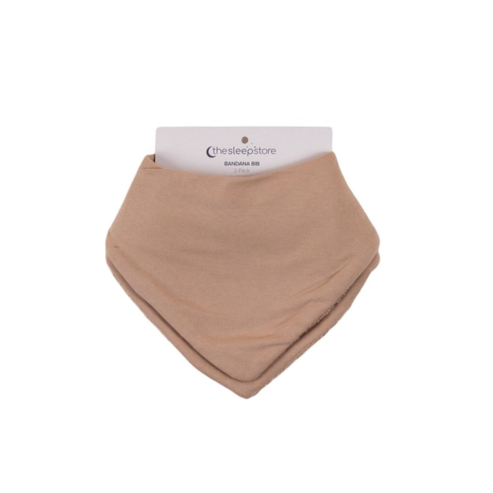 Brown bandana bib pack with a brand label on a white background