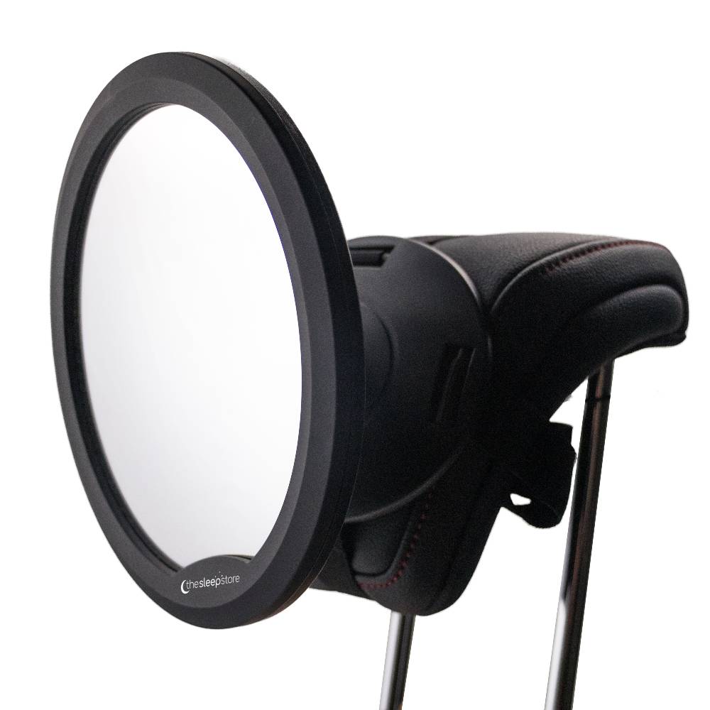 Round black baby carseat mirror with a white background
