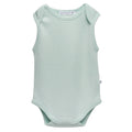 A sleeveless deluxe merino rib baby bodysuit in a pale mint green color, shown flat against a solid white background. The brand name 'The Sleep Store' is visible on the inner neck label.