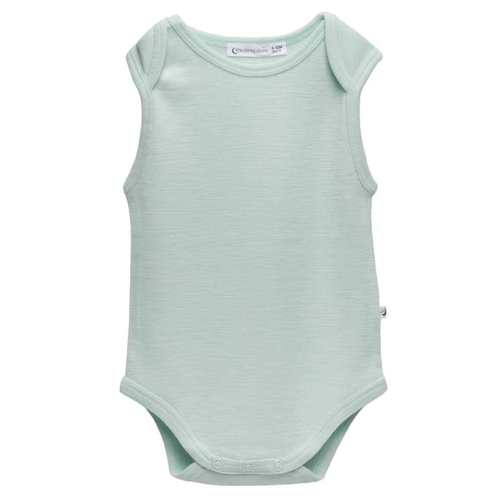 A sleeveless deluxe merino rib baby bodysuit in a pale mint green color, shown flat against a solid white background. The brand name 'The Sleep Store' is visible on the inner neck label.