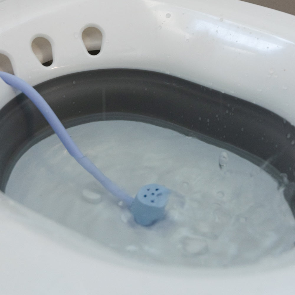 Postpartum sitz bath filler with water