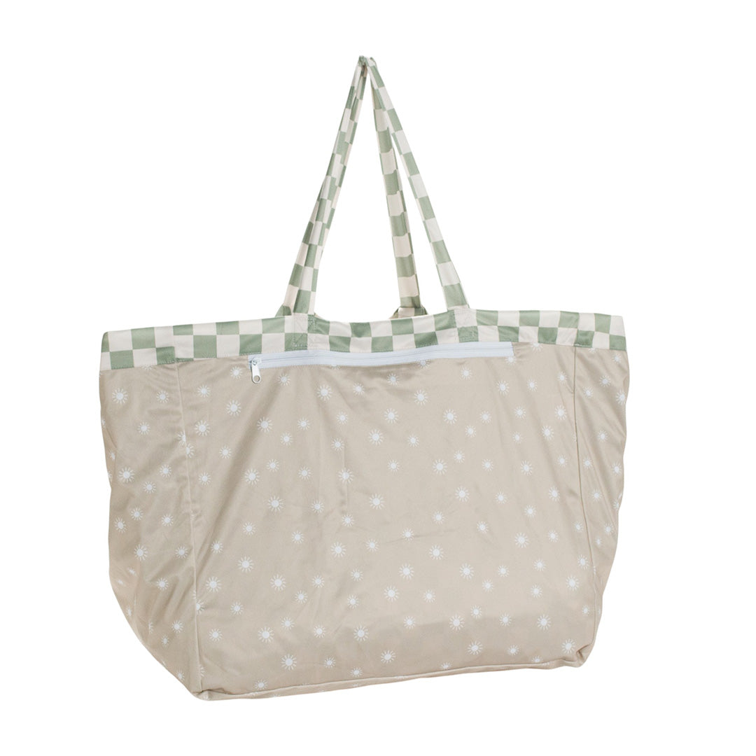 Beige Oat Sunshine print Nestling tote style beach bag with green checkered handles on a white background
