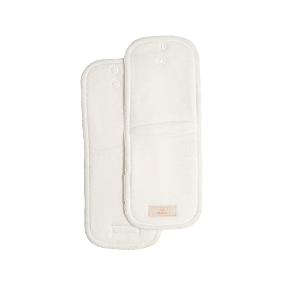 Two white baby diaper insert on a white background