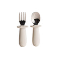 Set of Nestling oat baby cutlery, fork and spoon, on a white background