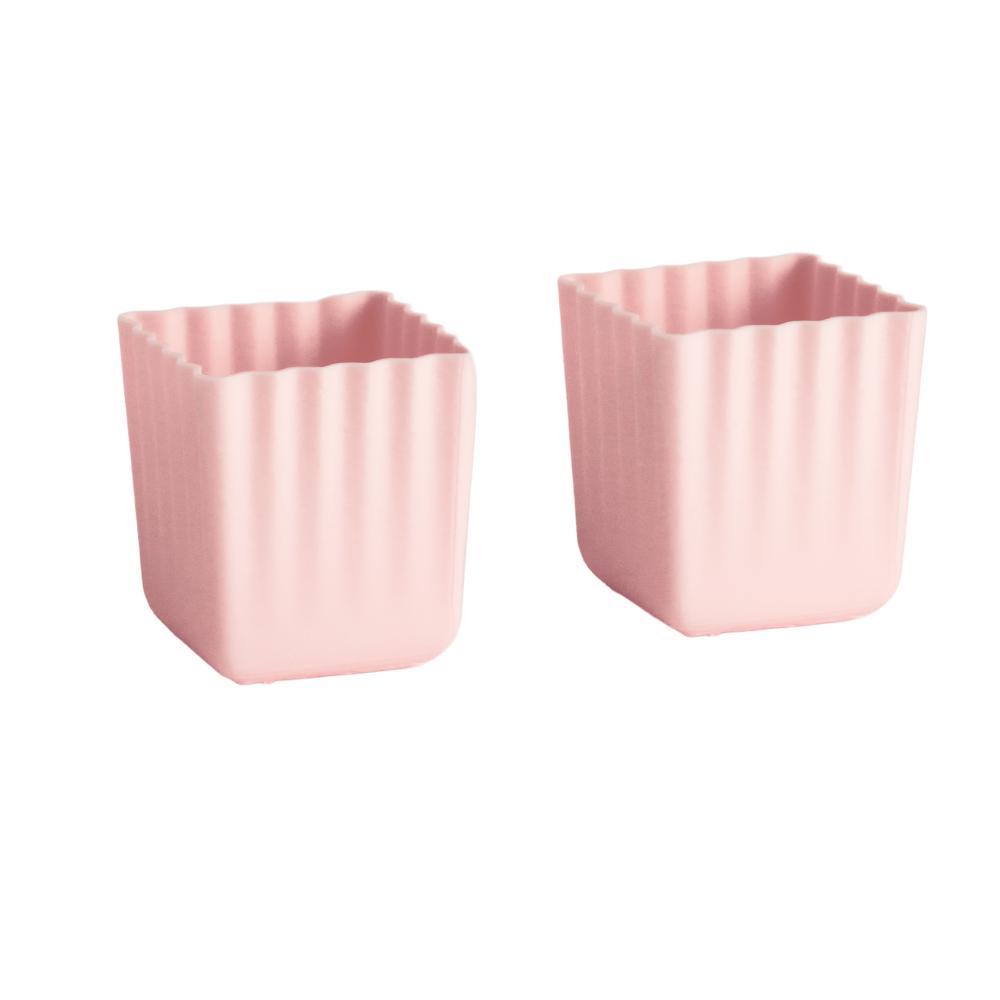 2 large pink silicone cups on a white background
