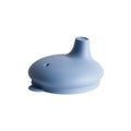 Blue silicone sippy cup lid on a white background