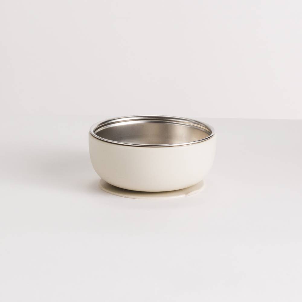 White stainless steel and silicone baby bowl on a white background
